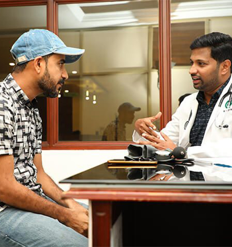 Dr. Mirdaz in consultation with a patient